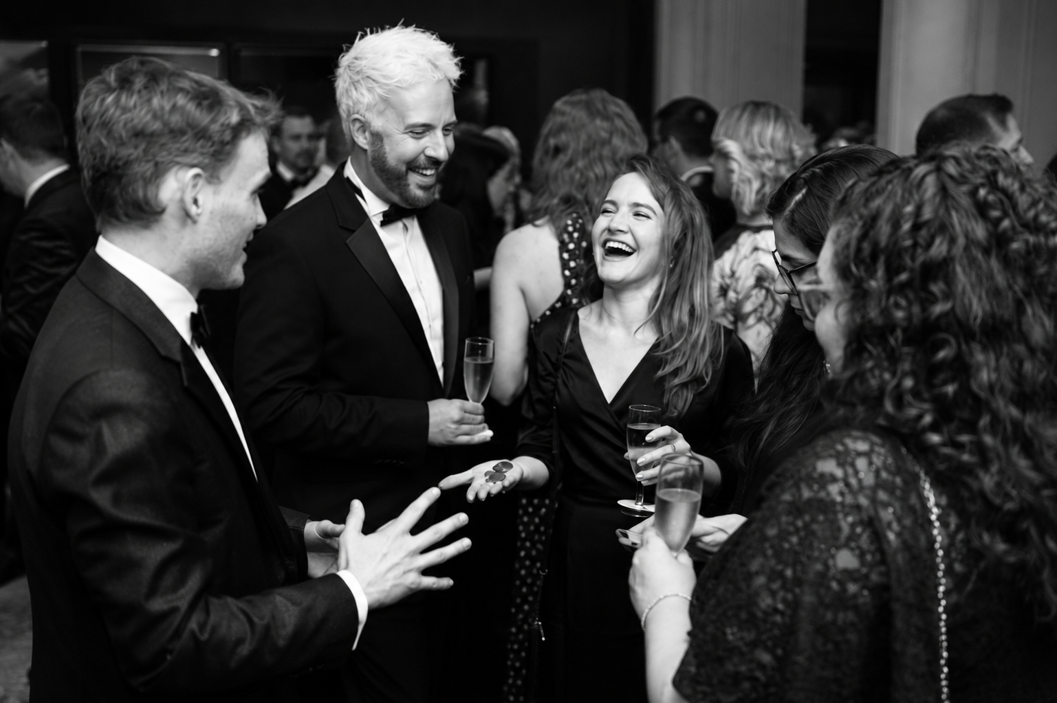 Corporate magician James Pritchard performing close-up magic at a London event