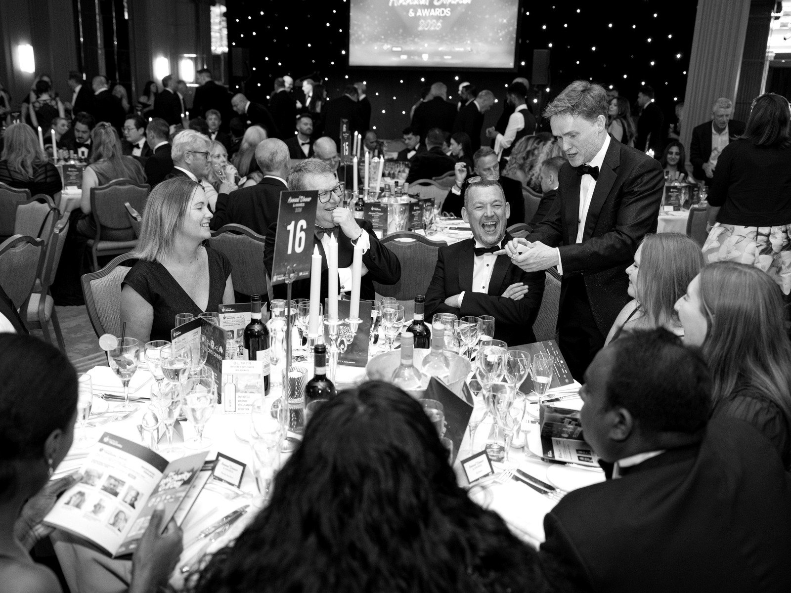 James Pritchard performing close-up magic for guests at a corporate event in London